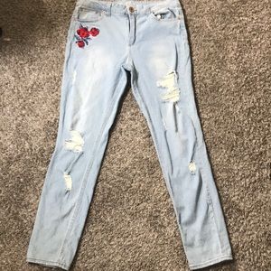 Rose embroidered blue jeans
